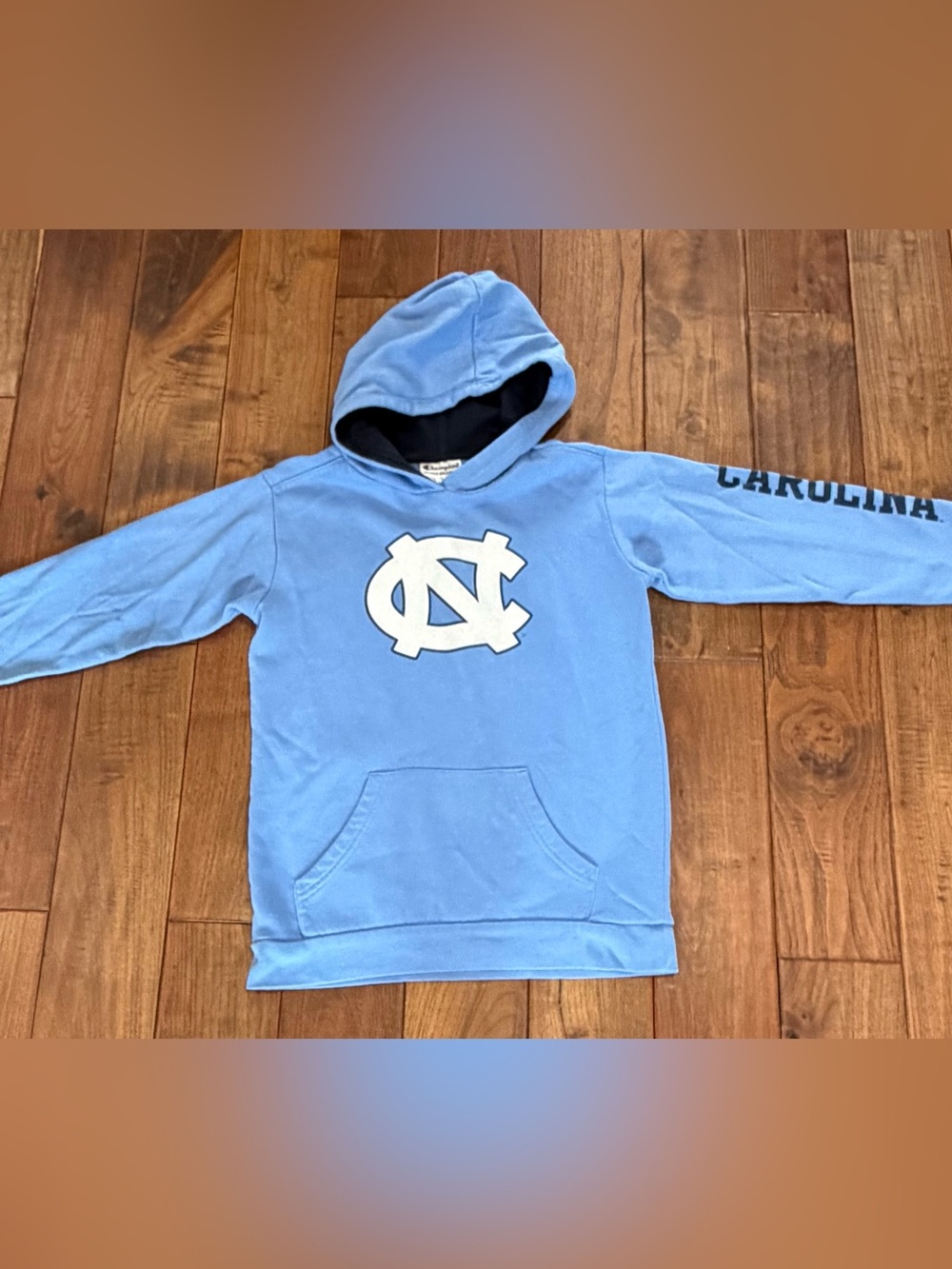 Champion Carolina Blue Hoodie with White UNC Logo
